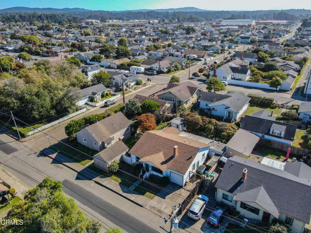 826 Cedar Street Fort Bragg, CA 95437 - Photo 37 of 42 an aerial view of residential houses with outdoor space