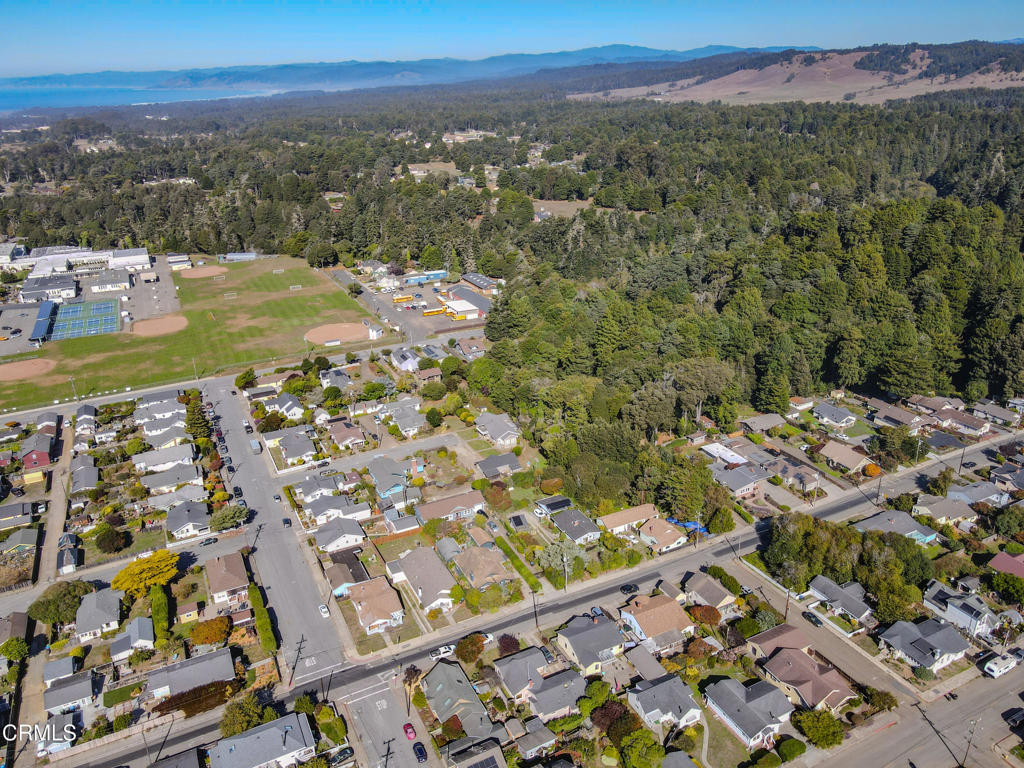 826 Cedar Street Fort Bragg, CA 95437 - Photo 39 of 42 an aerial view of residential houses with outdoor space