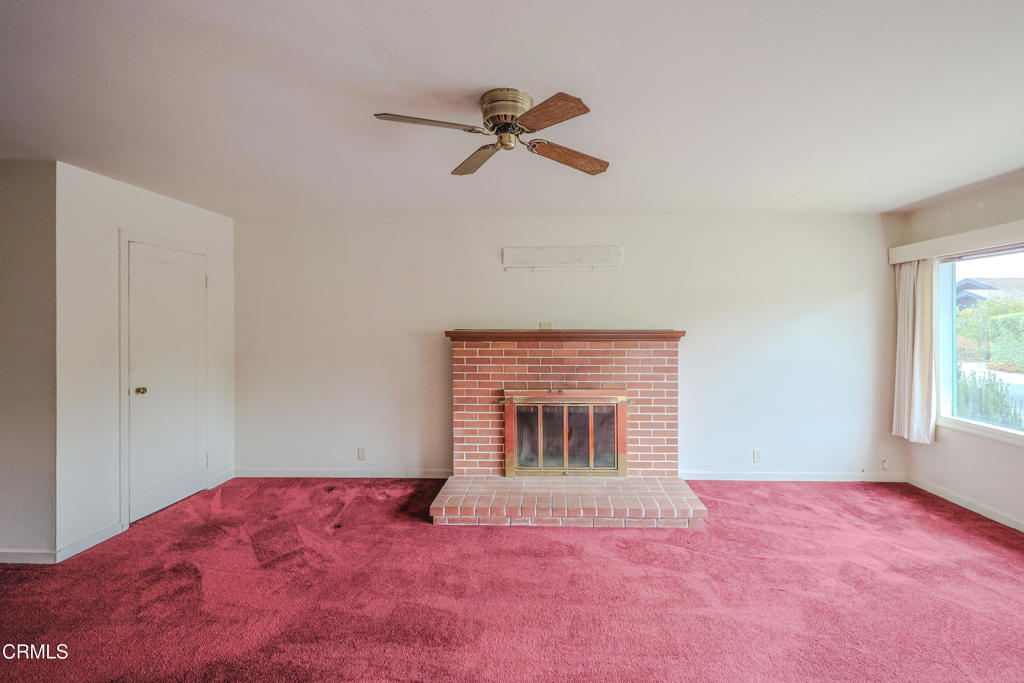 826 Cedar Street Fort Bragg, CA 95437 - Photo 5 of 42 a view of empty room with a fireplace