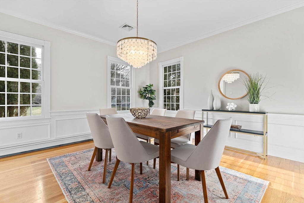34 Forest Street Hanover, MA 02339 - Photo 14 of 42 a view of a dining room with furniture