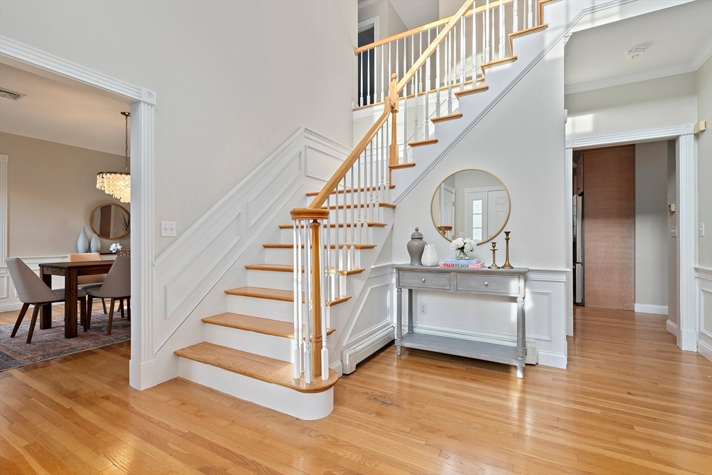 34 Forest Street Hanover, MA 02339 - Photo 18 of 42 a view of entryway and hall with wooden floor