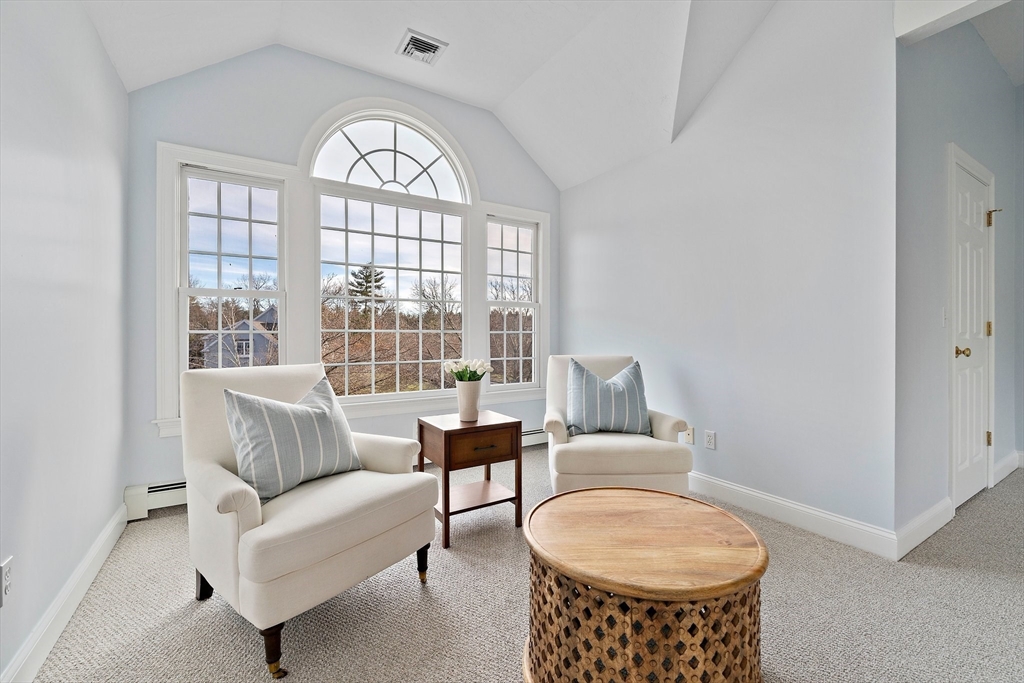34 Forest Street Hanover, MA 02339 - Photo 22 of 42 a living room with furniture and a large window