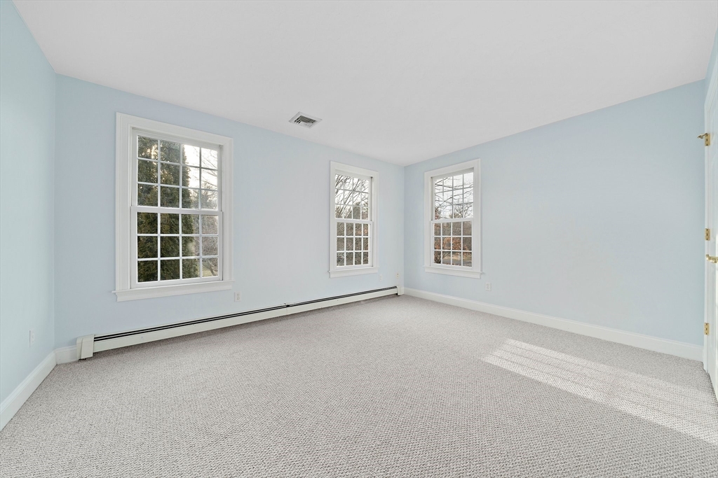 34 Forest Street Hanover, MA 02339 - Photo 26 of 42 a view of an empty room with a window