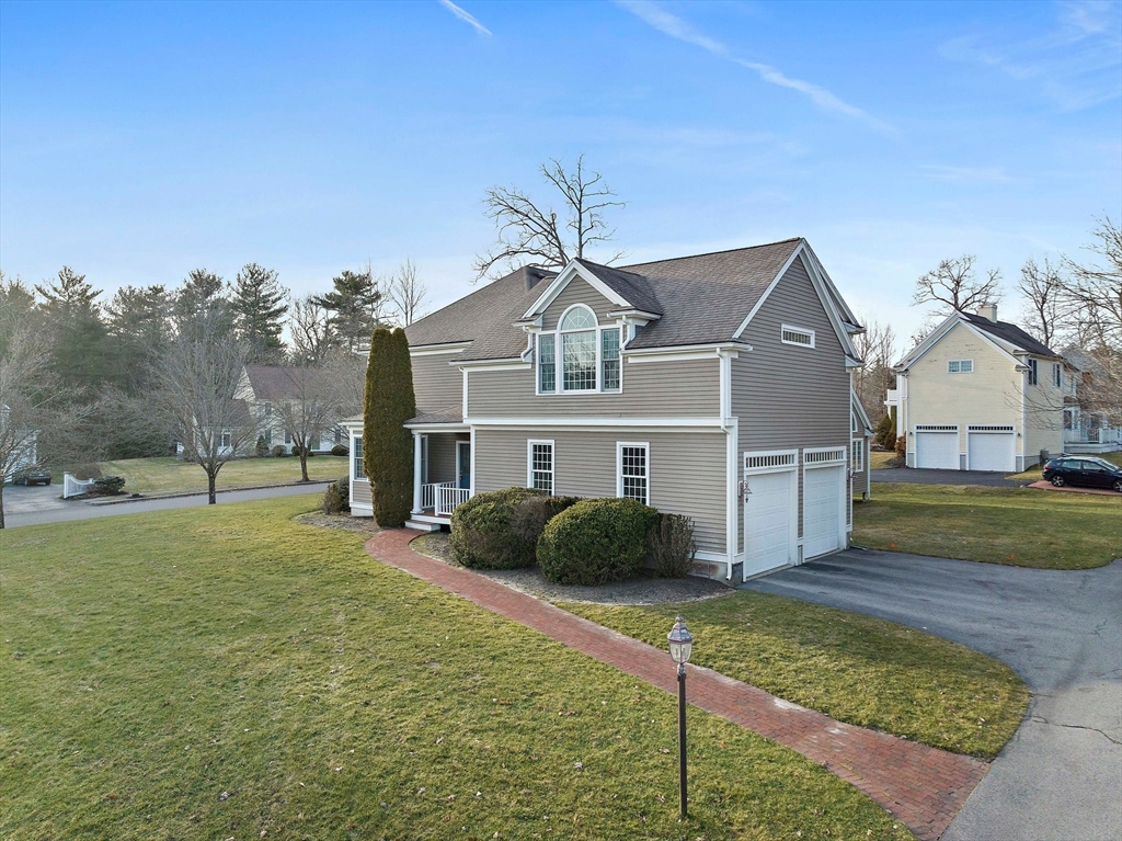 34 Forest Street Hanover, MA 02339 - Photo 37 of 42 a front view of a house with garden