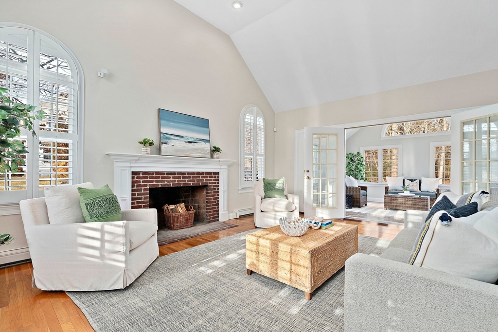 34 Forest Street Hanover, MA 02339 - Photo 10 of 42 a living room with furniture and a fireplace