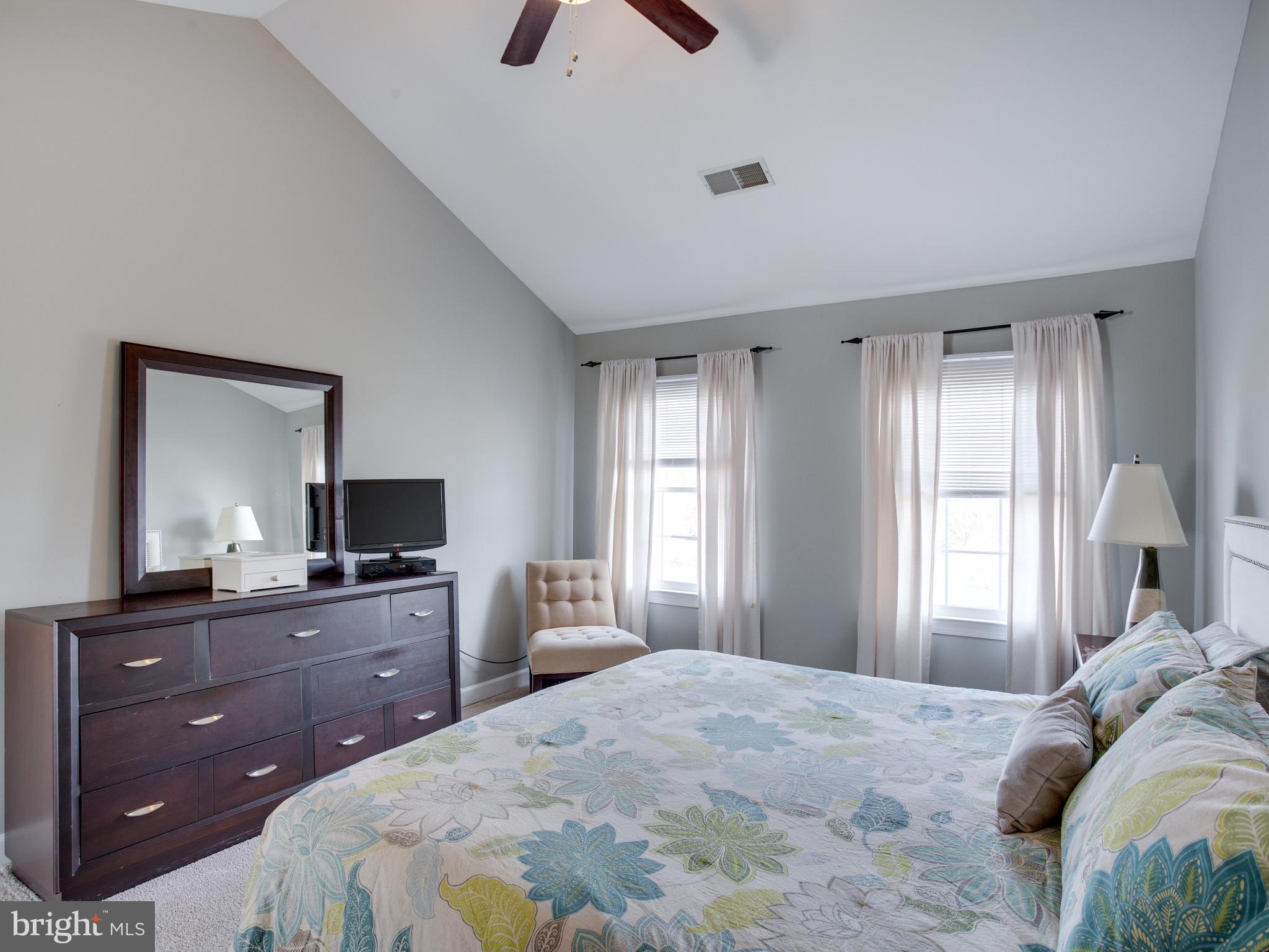 3235 Breckenridge Way Riva, MD 21140 - Photo 26 of 63 a bedroom with a bed and a flat screen tv