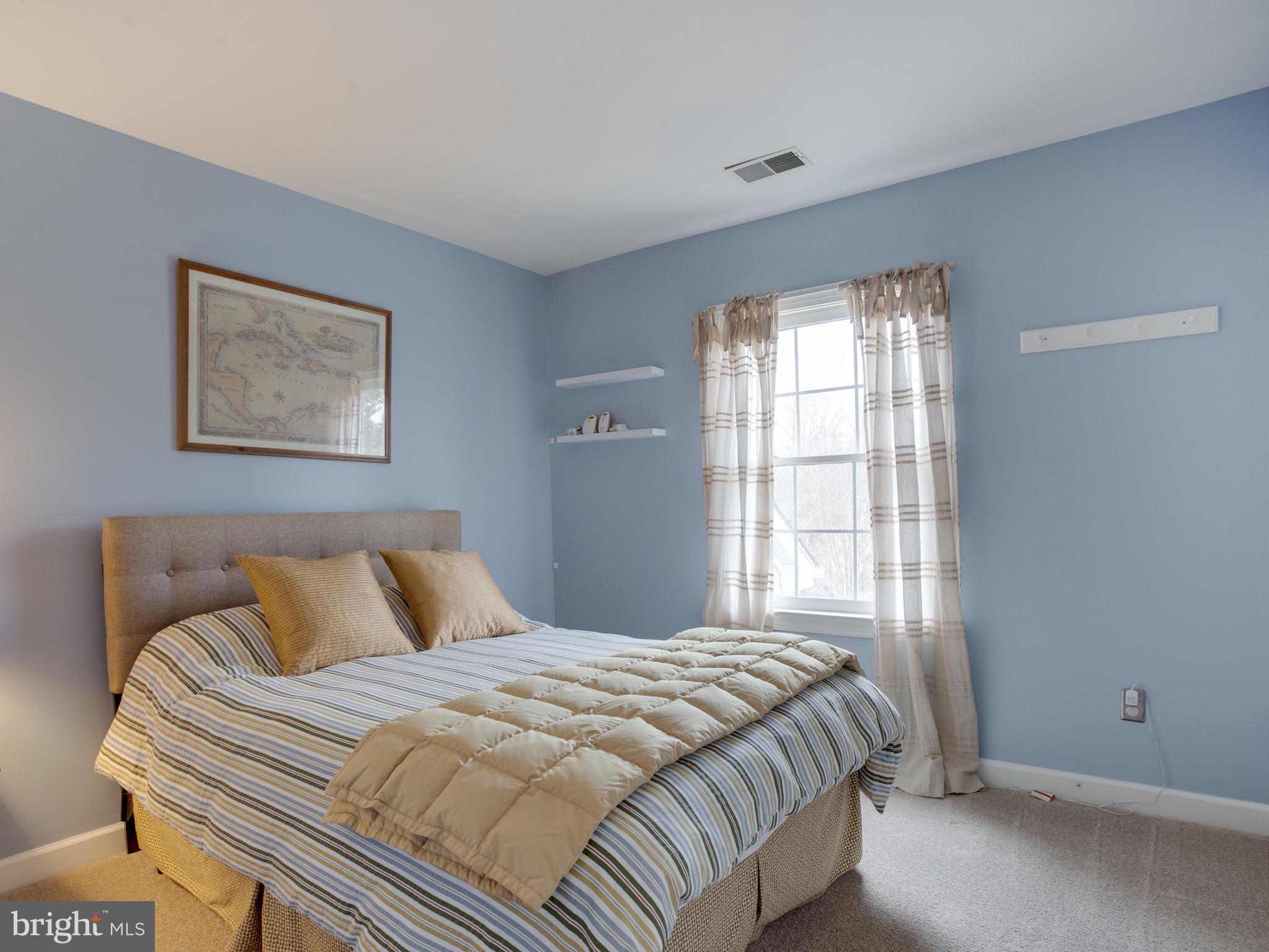 3235 Breckenridge Way Riva, MD 21140 - Photo 30 of 63 a bedroom with a bed and a window