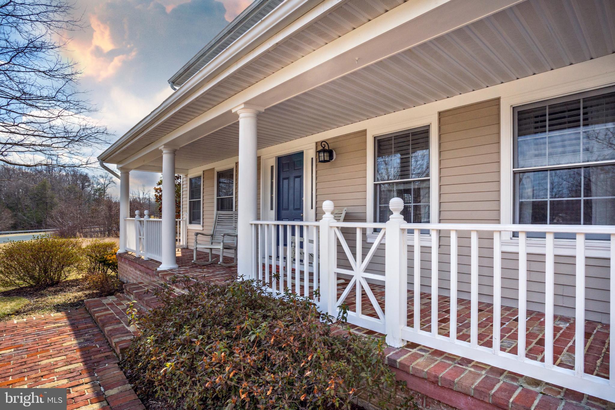3235 Breckenridge Way Riva, MD 21140 - Photo 4 of 63 a view of a house with wooden deck and furniture