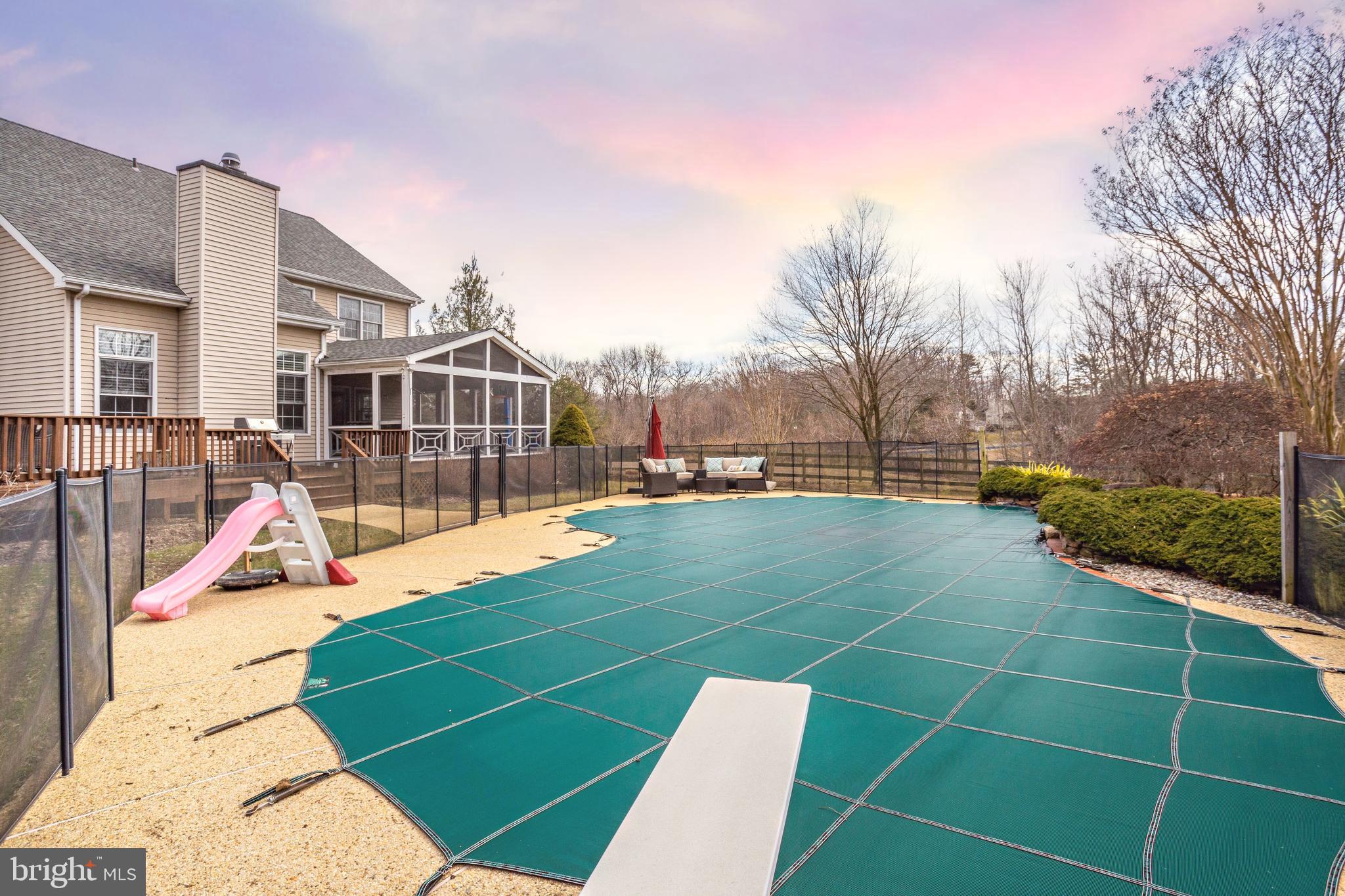3235 Breckenridge Way Riva, MD 21140 - Photo 48 of 63 a view of a tennis ground with large trees