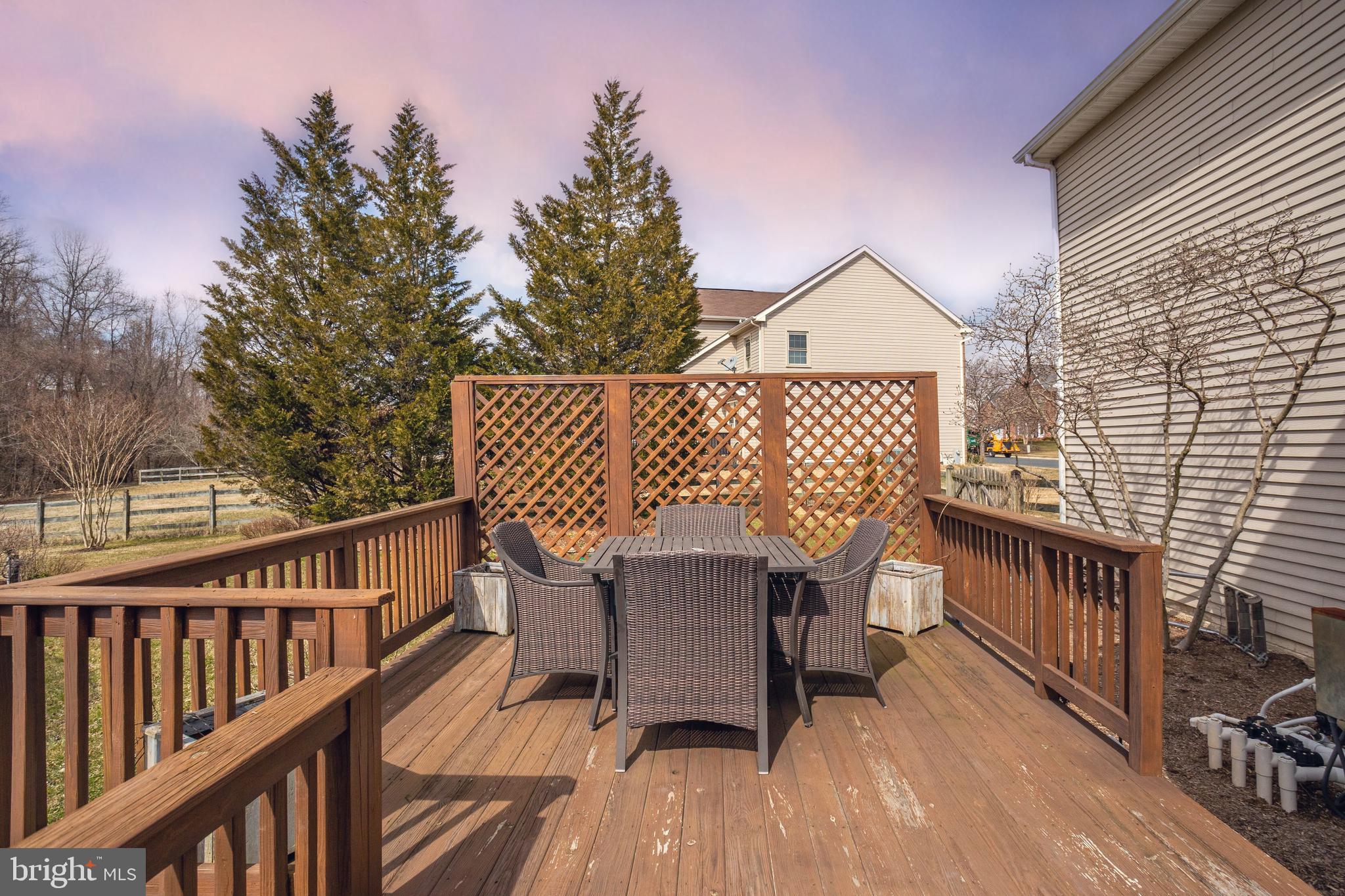 3235 Breckenridge Way Riva, MD 21140 - Photo 49 of 63 a view of a deck with two chair and wooden floor
