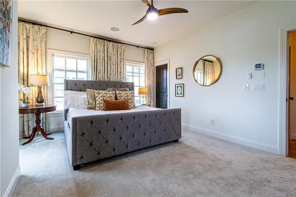 a bed room with a bed and a window