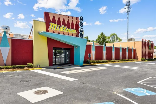 a view of a building with a street