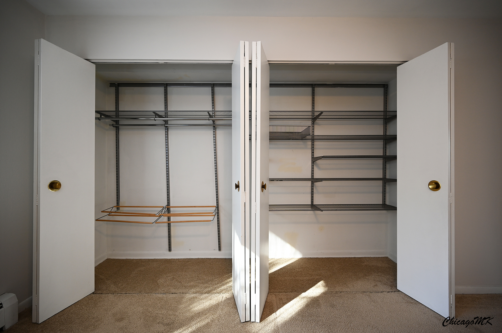 2230 South Goebbert Road, Unit 339 Arlington Heights, IL 60005 - Photo 23 of 38 a view of a room with shelves