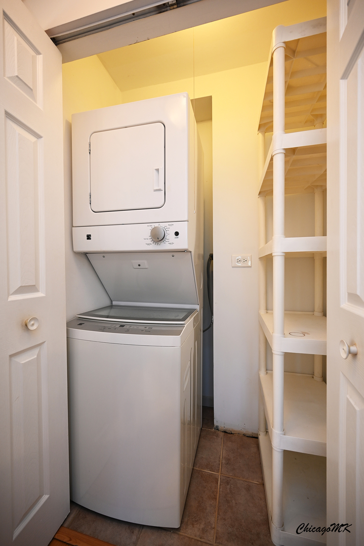 2230 South Goebbert Road, Unit 339 Arlington Heights, IL 60005 - Photo 25 of 38 a utility room with dryer and washer