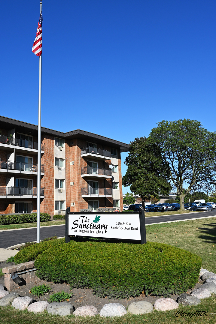 2230 South Goebbert Road, Unit 339 Arlington Heights, IL 60005 - Photo 38 of 38 a sign on the side of a road