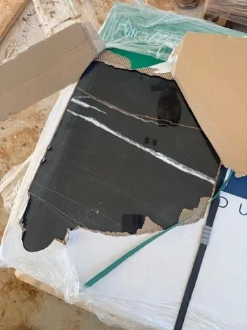 a view of an empty room with a fireplace