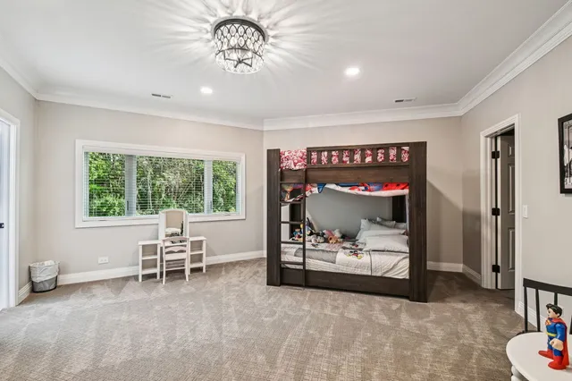 a dining area with furniture and a clock