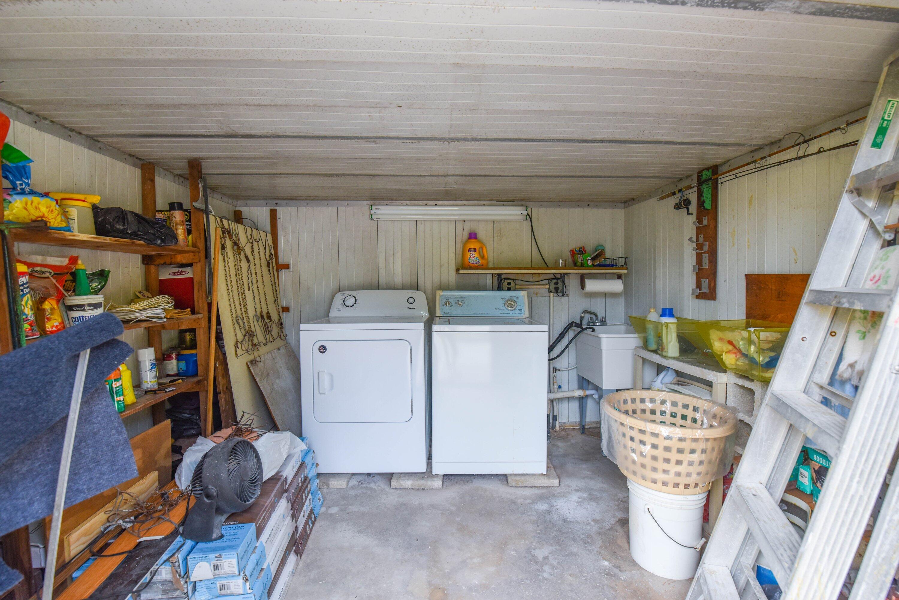 80 Sands Road Big Pine Key, FL 33043 - Photo 10 of 18 Storage shed and laundry