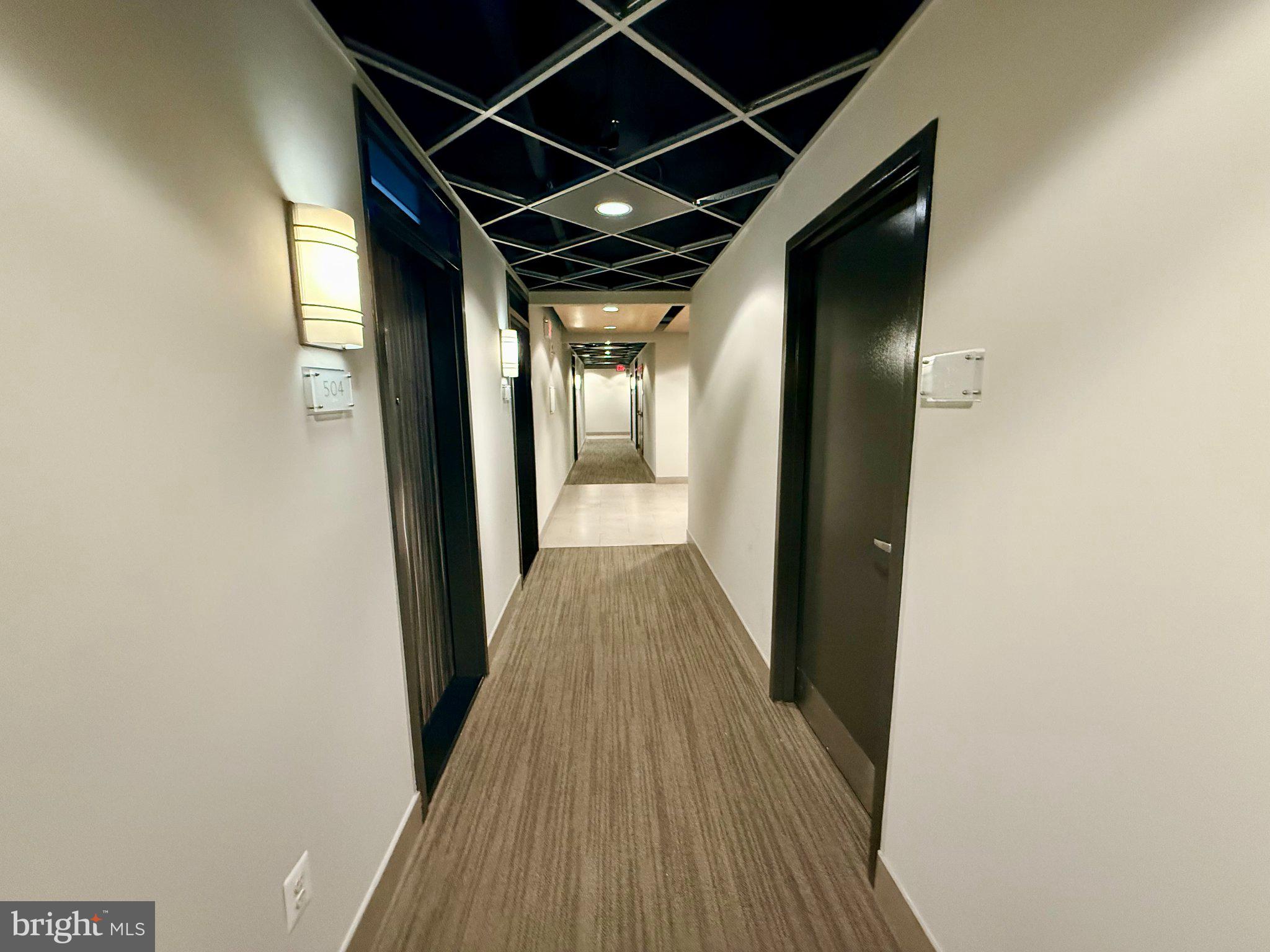 1133 14th Street Northwest, Unit 503 Washington, DC 20005 - Photo 19 of 29 Modern corridor with sleek design.