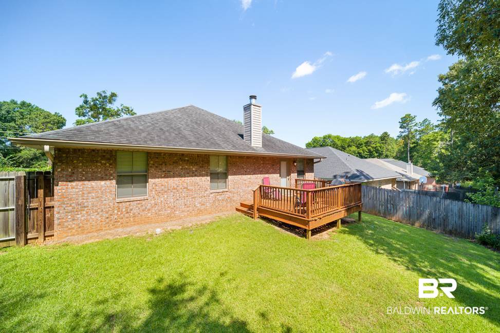 9012 Brookside Lane Daphne, AL 36526 - Photo 20 of 27 Fenced backyard w/deck