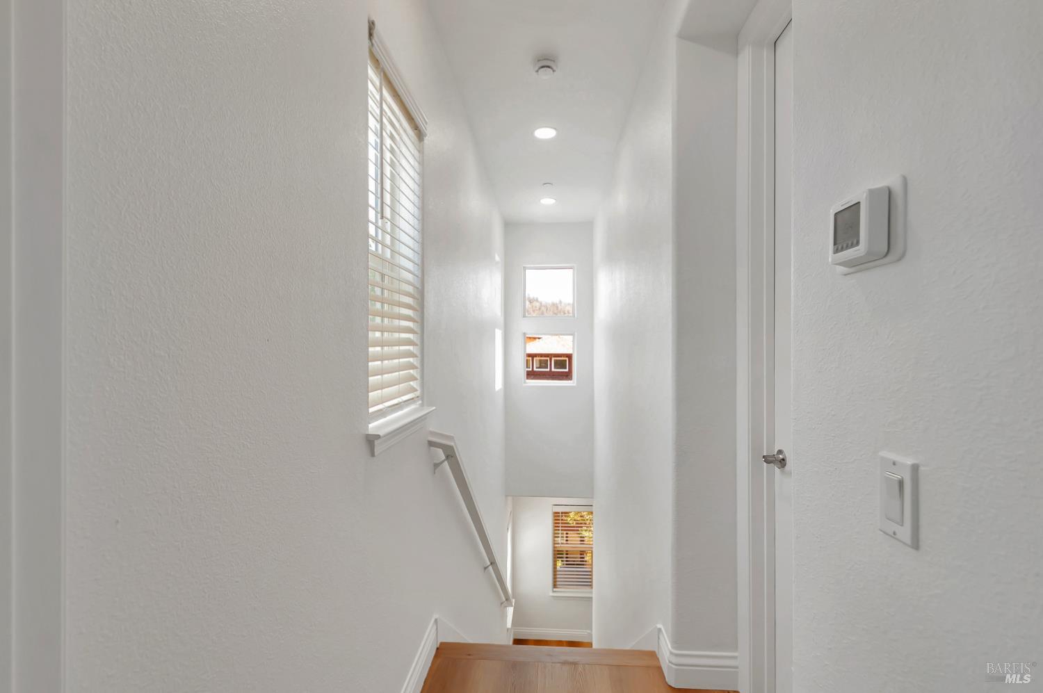 4242 Streamside Drive Santa Rosa, CA 95409 - Photo 16 of 29 a view of a hallway with staircase