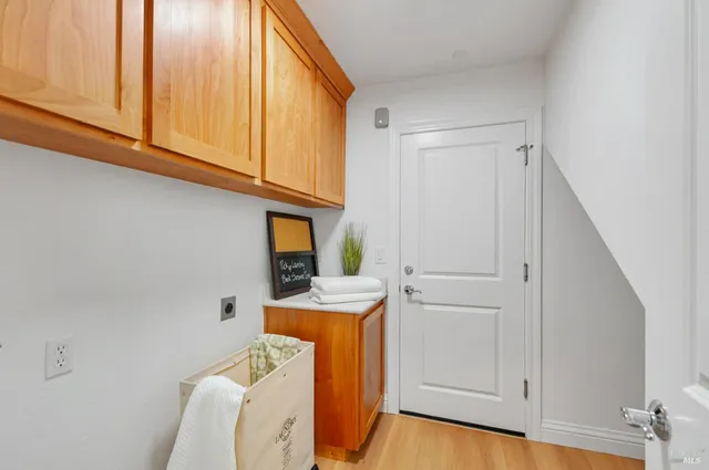 a view of a kitchen with washer and dryer