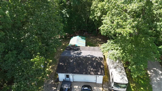 a backyard of a house with lots of green space