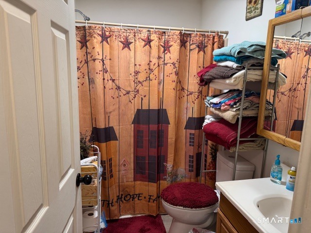 39 Courtney Lane Killingly, CT 06241 - Photo 5 of 10 a bathroom with a toilet and a sink