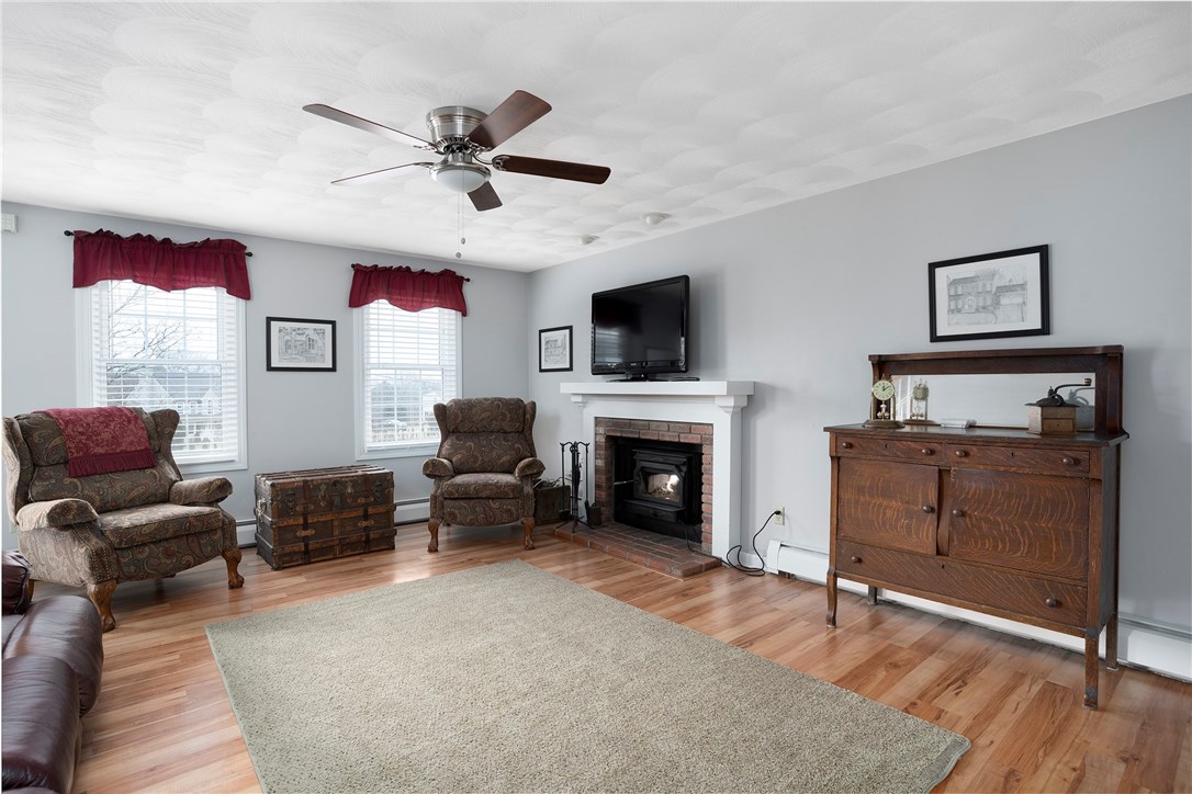 90 Stillwater Road Charlestown, RI 02813 - Photo 3 of 37 Living room with wood burning fireplace
