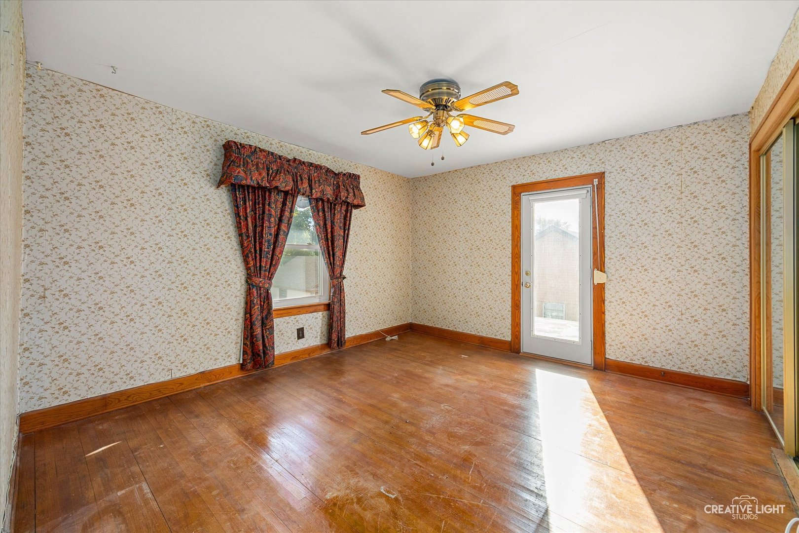 363 Orchard Street Elgin, IL 60123 - Photo 17 of 27 a view of an empty room with a window