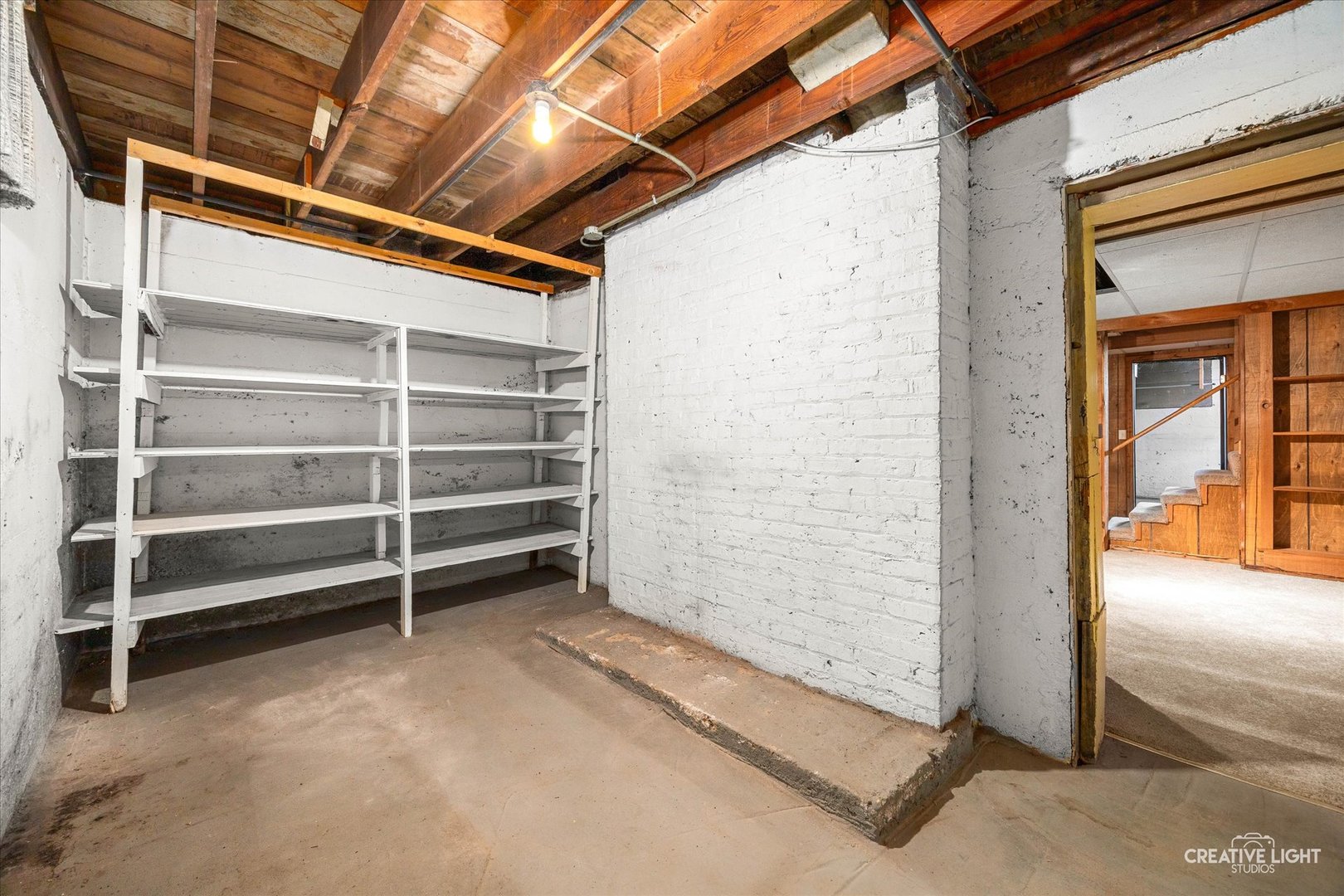 363 Orchard Street Elgin, IL 60123 - Photo 20 of 27 a view of an empty room with a staircase
