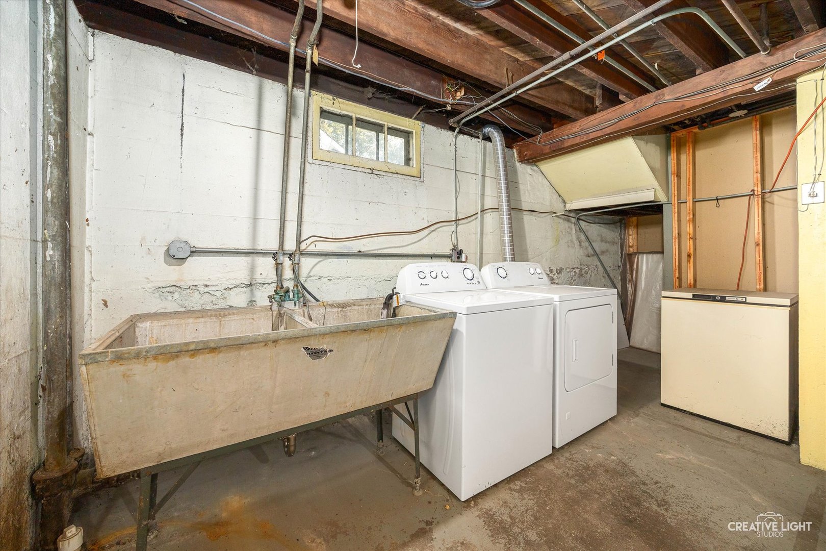 363 Orchard Street Elgin, IL 60123 - Photo 21 of 27 a utility room with a washer and dryer