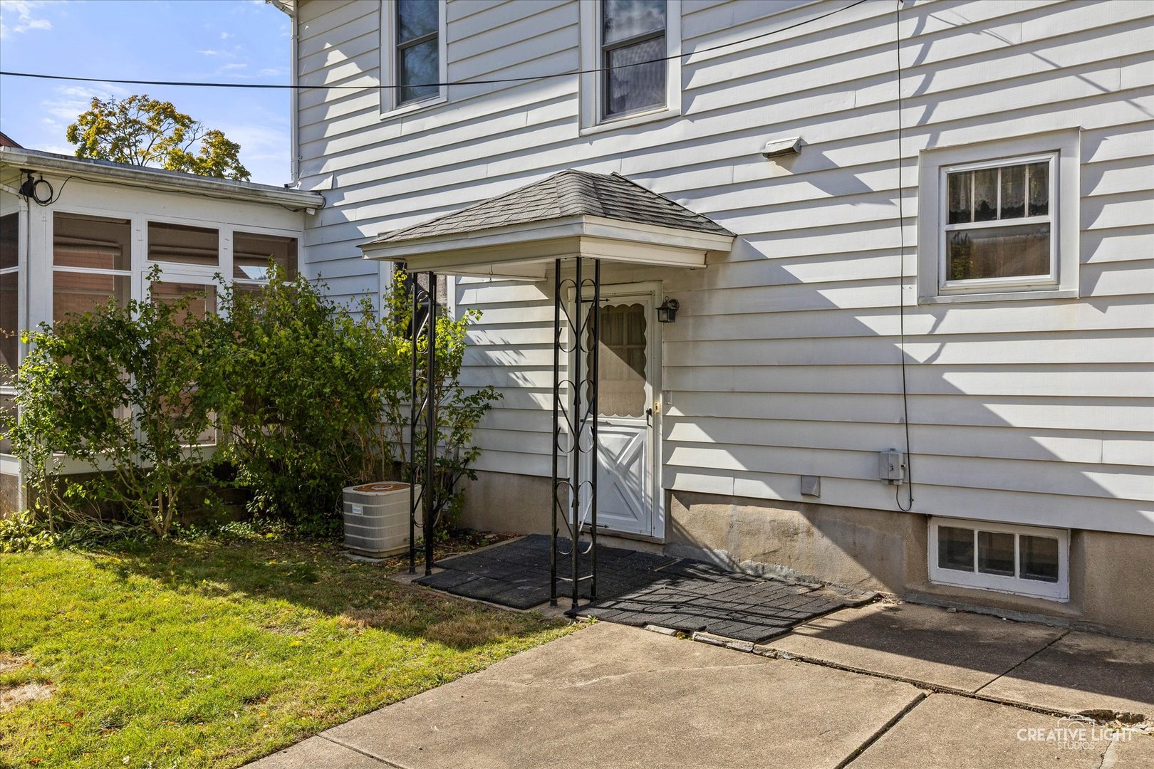 363 Orchard Street Elgin, IL 60123 - Photo 23 of 27 a view of a house with backyard and garden