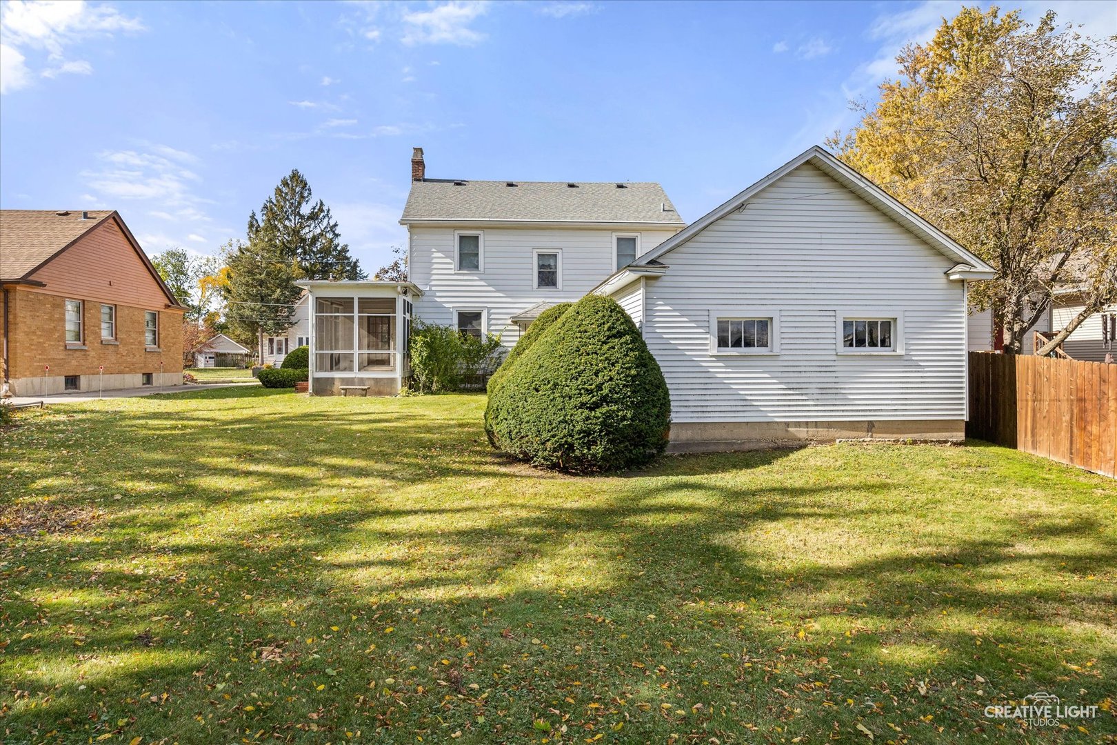 363 Orchard Street Elgin, IL 60123 - Photo 26 of 27 a view of a white house with a swimming pool