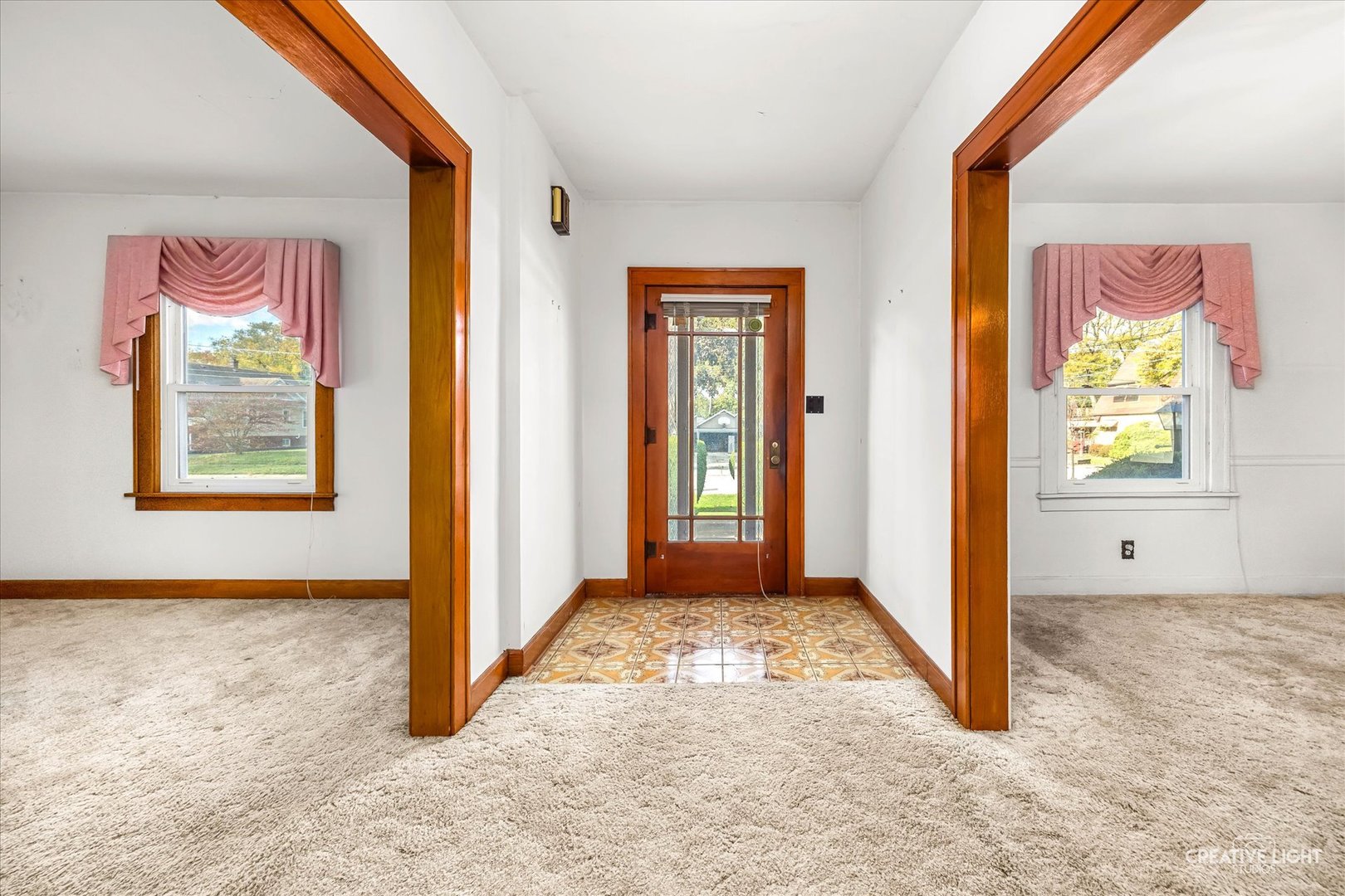 363 Orchard Street Elgin, IL 60123 - Photo 3 of 27 an empty room with windows and closet