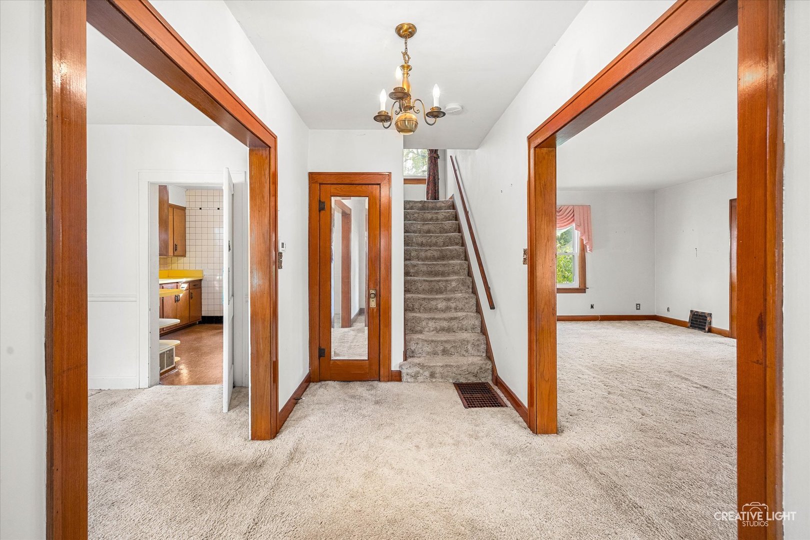 363 Orchard Street Elgin, IL 60123 - Photo 4 of 27 a view of a hallway view with staircase
