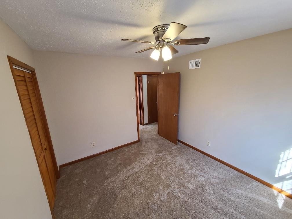3478 Cane Ridge Drive Memphis, TN 38109 - Photo 12 of 19 wooden floor in an empty room