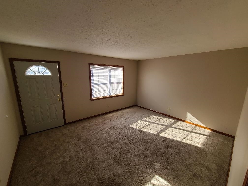 3478 Cane Ridge Drive Memphis, TN 38109 - Photo 2 of 19 an empty room with windows