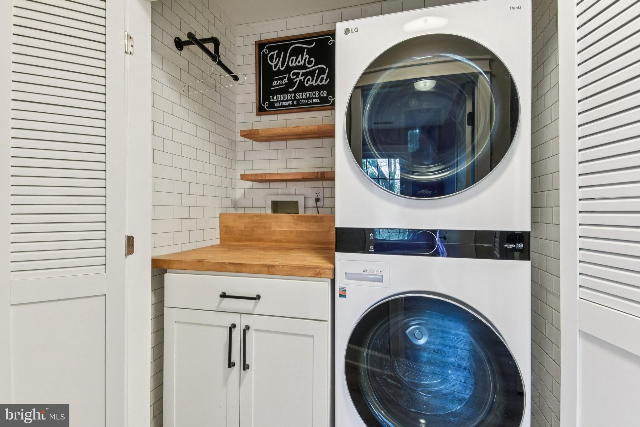 2576 Hidden Cove Road, Unit 154 Annapolis, MD 21401 - Photo 22 of 51 Sleek laundry space with modern appliances.
