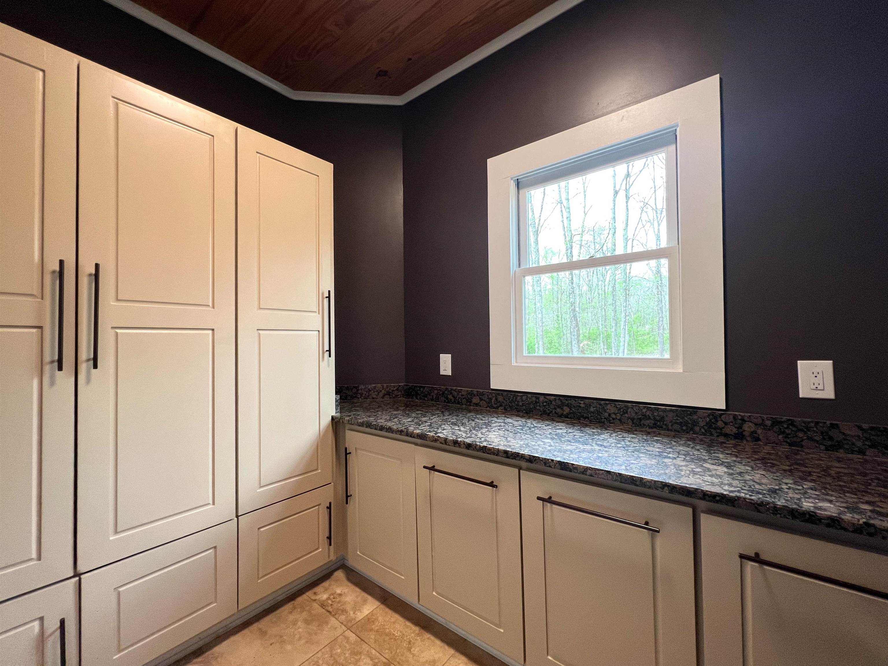 9490 Highway 196 Collierville, TN 38017 - Photo 25 of 39 Laundry Room with ornamental molding and wood ceiling
