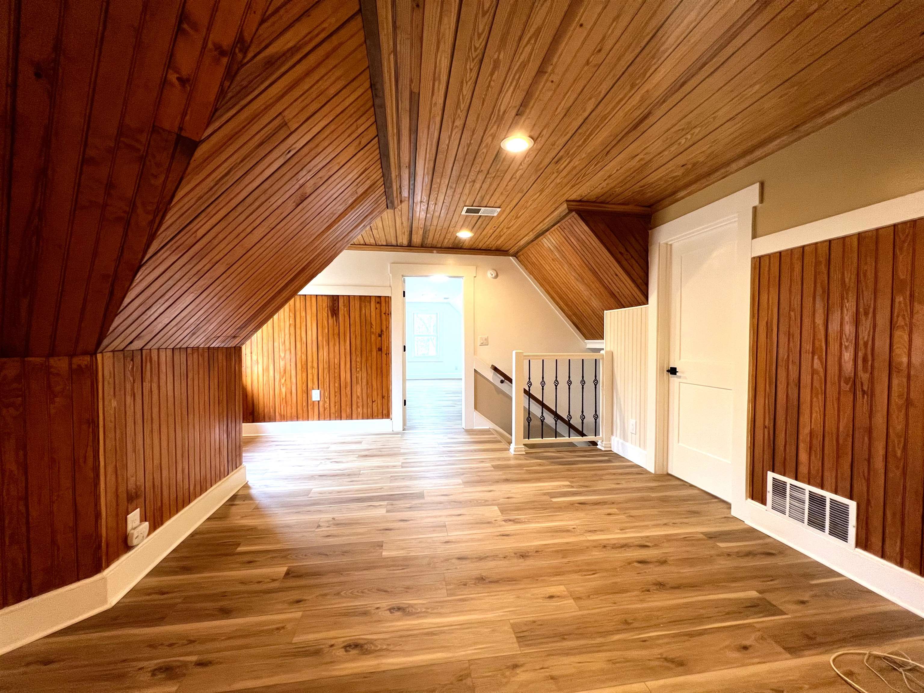 9490 Highway 196 Collierville, TN 38017 - Photo 28 of 39 Bonus room with wooden walls, light wood finished floors, and a vaulted wood ceiling