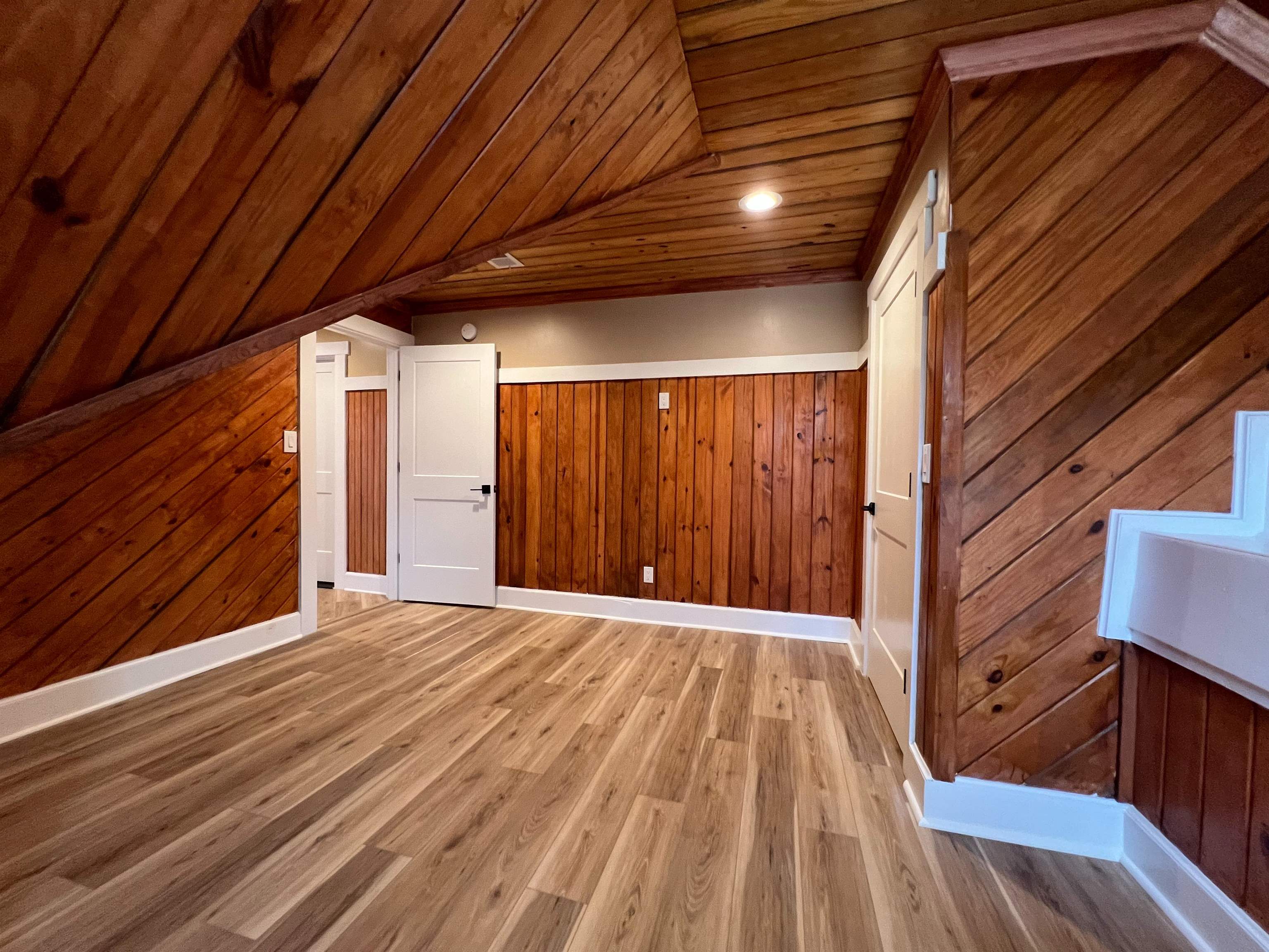 9490 Highway 196 Collierville, TN 38017 - Photo 34 of 39 Bedroom four with wood walls, recessed lighting, light wood finished floors, and a vaulted wood ceiling