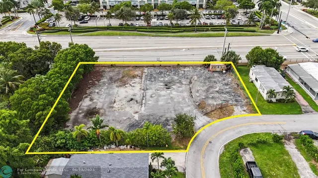 a view of swimming pool with a yard