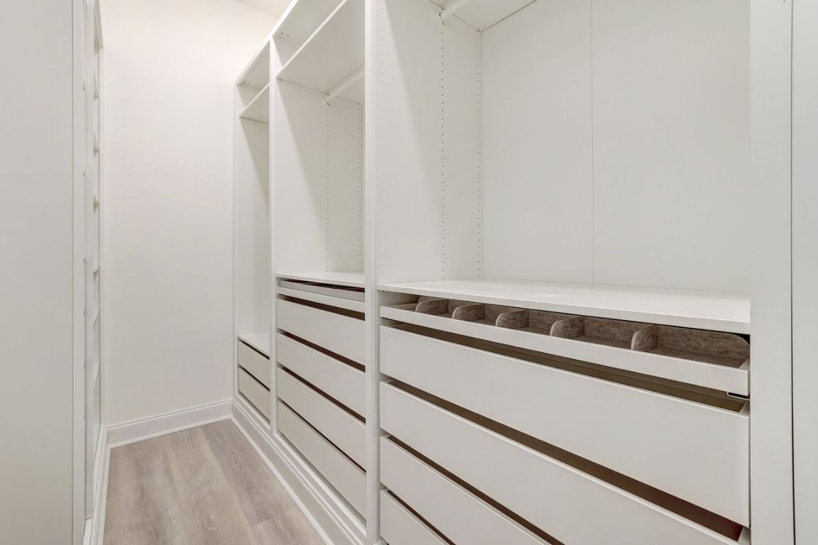 4705 Sea Salt Drive Austin, TX 78747 - Photo 12 of 19 Spacious closet featuring light wood-type flooring