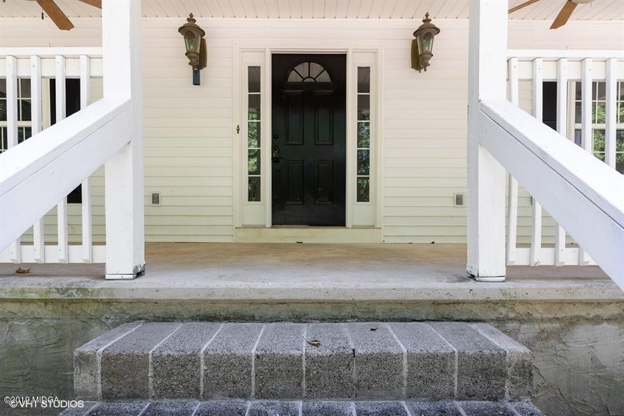 4071 Hollis Road Roberta, GA 31078 - Photo 2 of 22 a view of a brick house with many windows