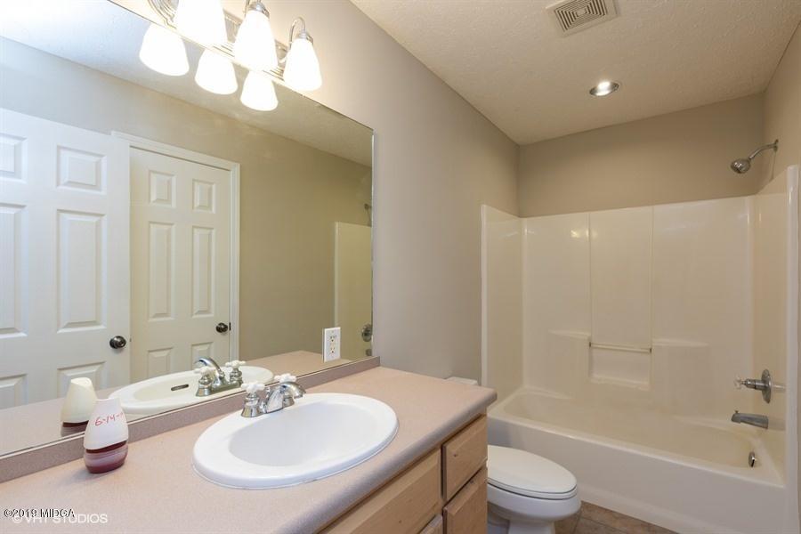 4071 Hollis Road Roberta, GA 31078 - Photo 15 of 22 a bathroom with a sink a toilet and shower