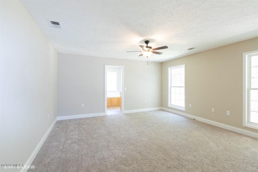 4071 Hollis Road Roberta, GA 31078 - Photo 18 of 22 a view of an empty room with a window