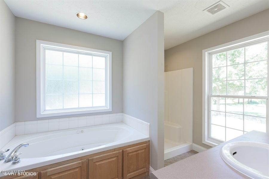 4071 Hollis Road Roberta, GA 31078 - Photo 19 of 22 a bath tub sitting next to a window