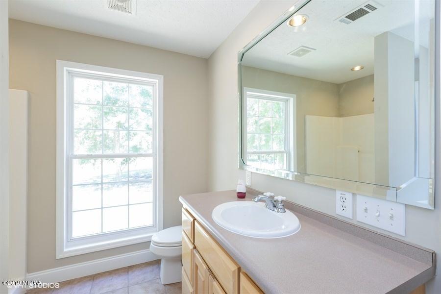 4071 Hollis Road Roberta, GA 31078 - Photo 20 of 22 a bathroom with a sink and a window