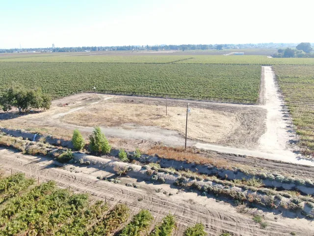 a view of an ocean beach and mountain